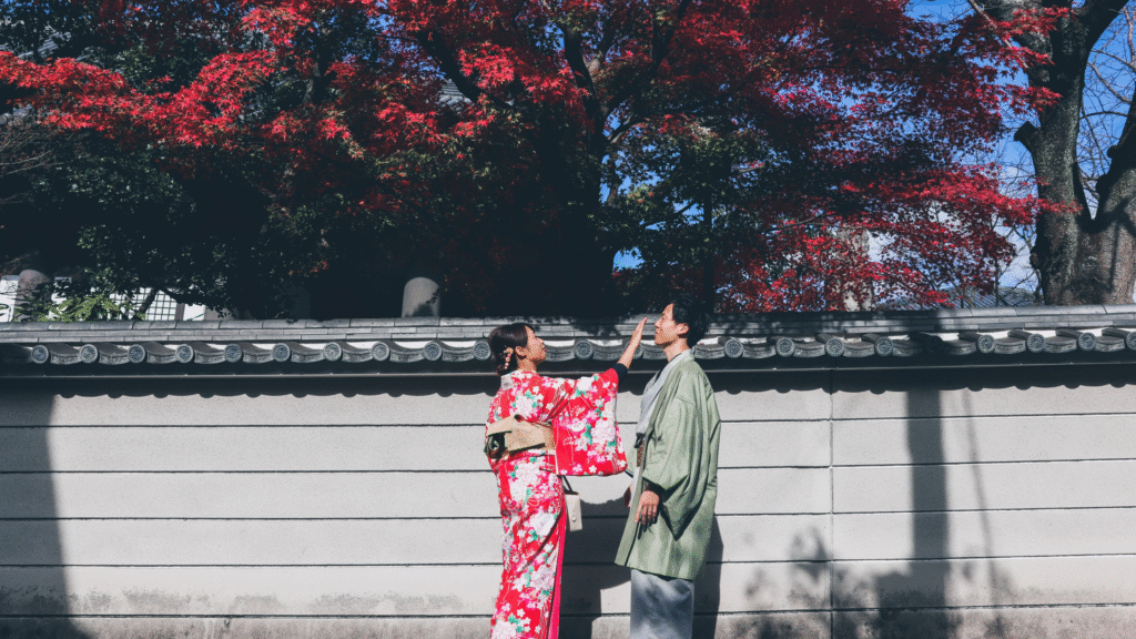 Kyoto autumn leaves at a temple, ideal for a romantic getaway in Japan