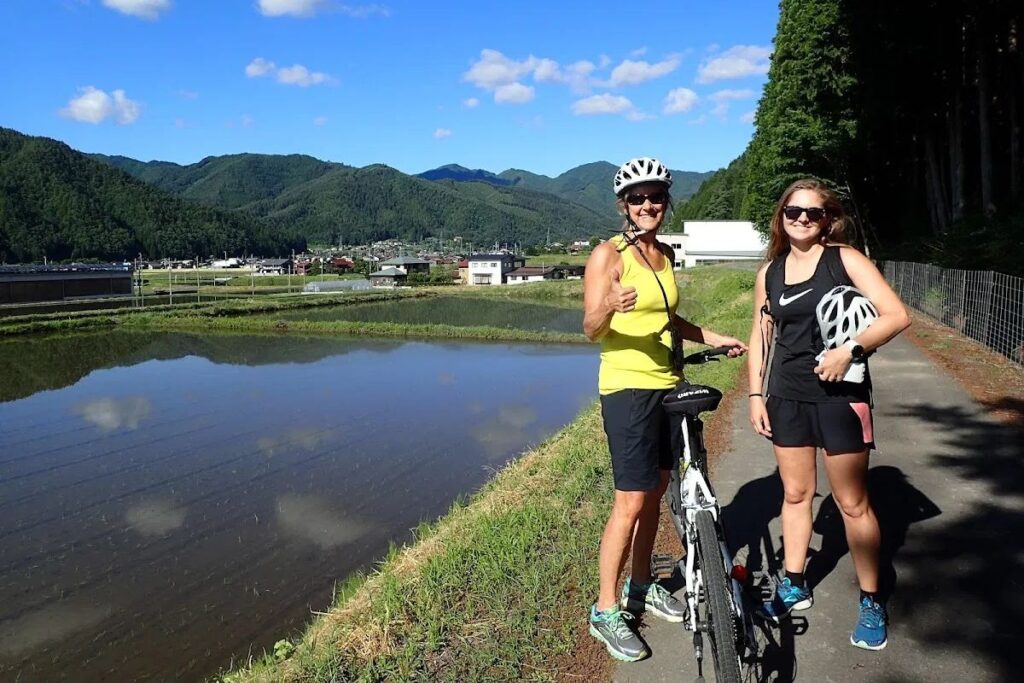 A clear blue sky over green mountains in Gifu.