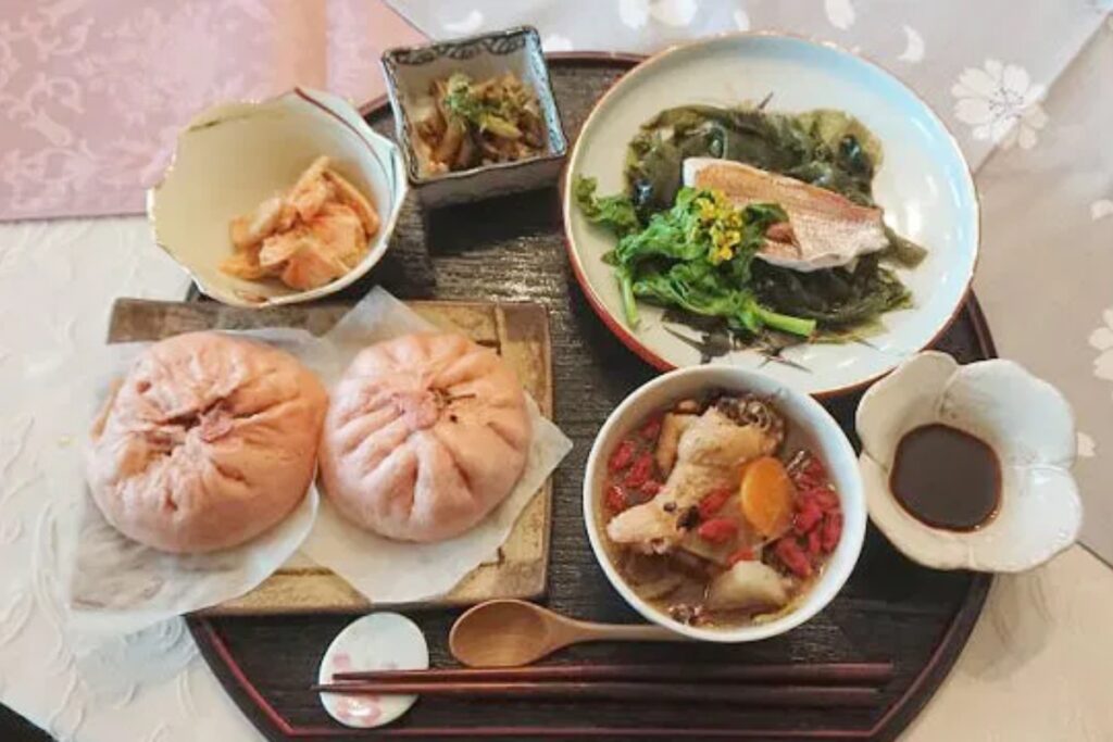 easonal Japanese dishes with sakura buns, simmered fish, and goji berry soup at a Nagoya home