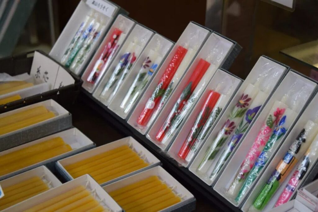 Beautifully decorated handcrafted chopsticks on display at a traditional retail outlet in Takayama.