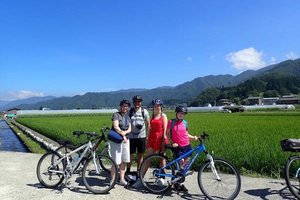 Family enjoying the Hida Countryside Bike Tour in rural Japan.