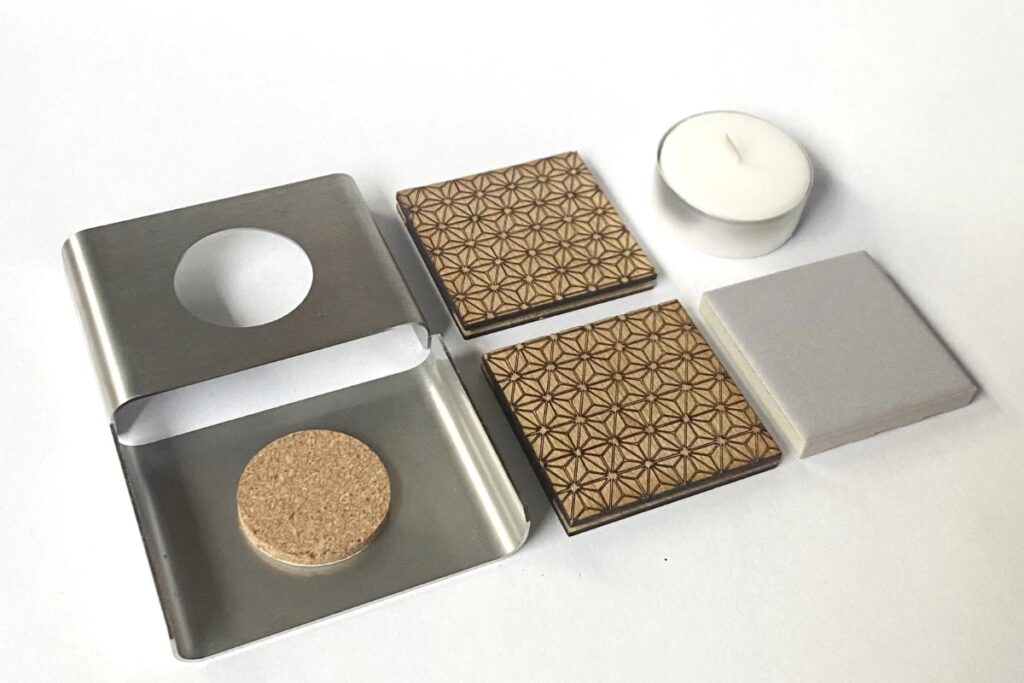 The compact, beautifully organized components of the luxury folding warmer provided at our Uji matcha incense workshop.