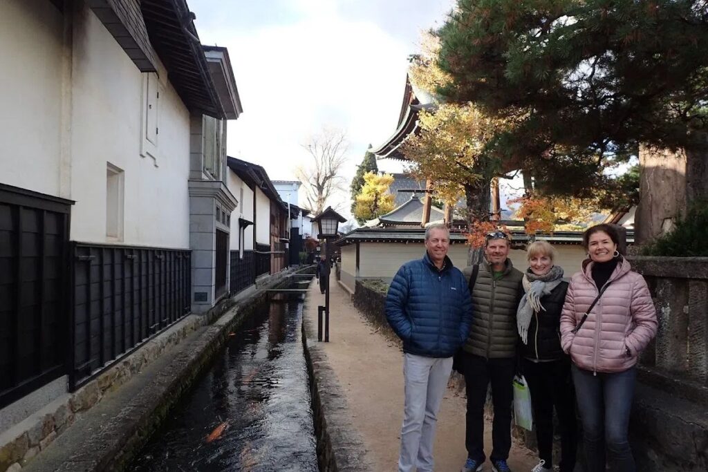 A small group walking along the historic Setogawa canal during a private Hida Furukawa town walk.