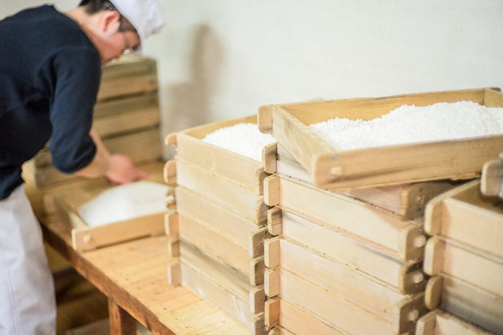 Traditional wooden koji boxes used in production, viewed during the heritage tour
